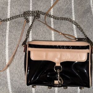 Black and tan leather/plastic gently used bag.